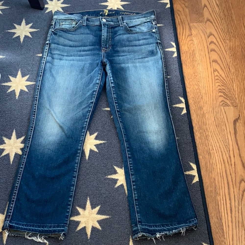 7 for all mankind cropped bootcut jeans.  Have a flair